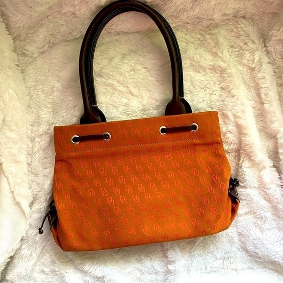 GENTLY used dooney bourke handbag orange. - Picture 2 of 7